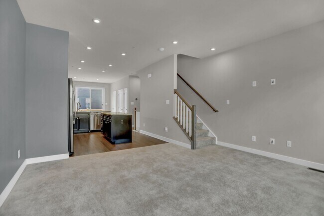 Building Photo - Luxury 4-Story Townhome with Rooftop Terrace!