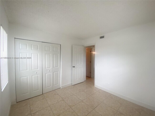 Building Photo - 10489 NW 8th St