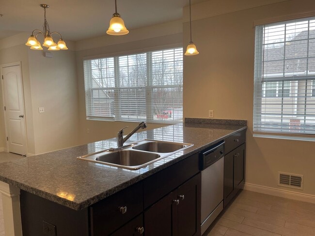 Building Photo - Shelby Township - 3 Bedroom, 2 Bath, End-Unit condo style w/Att Garage