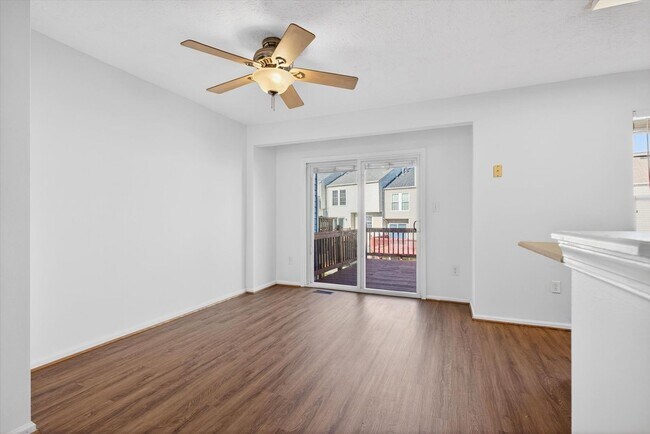 Building Photo - 3BR Townhome in Russett | 3 Levels | Walkout Basement + Deck | $2,400/mo** Beautiful 3-level town...