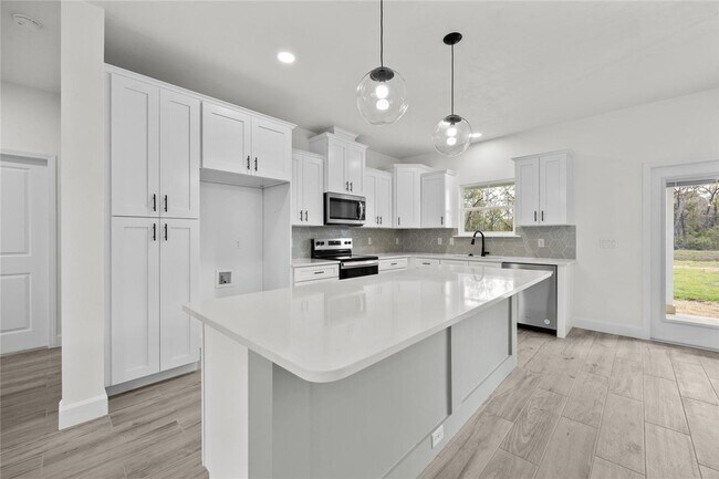 Building Photo - New Construction 3/2 in Bronson