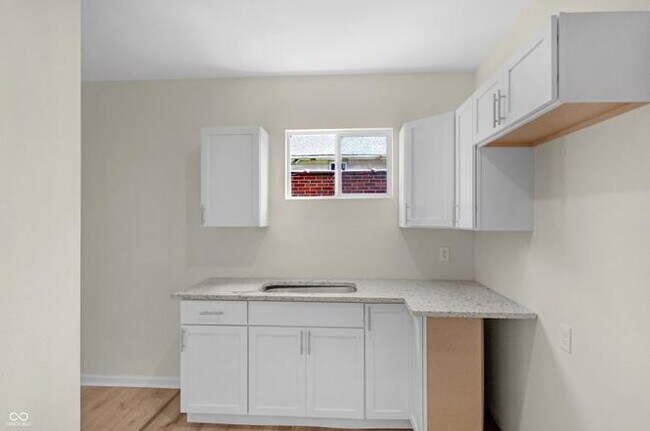 Building Photo - "Charming 3-Bed Duplex with Modern Comforts at 2235 MLK Jr Street, Indianapolis!"