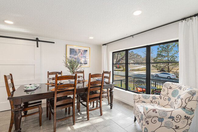 Dining room full of natural light from south facing picture window - 881 3rd St