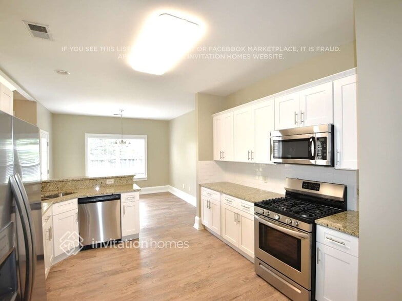 Building Photo - 302 Grandiflora Dr