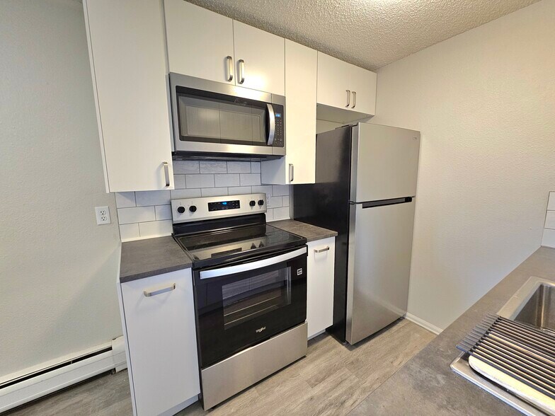 All Stainless Steel appliances with gourmet microwave - 12th and Wads Residences