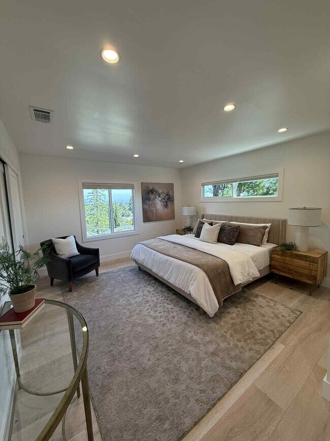 Building Photo - Modern 4-Bedroom Retreat in San Carlos – Remodeled, Spacious, Private Yard