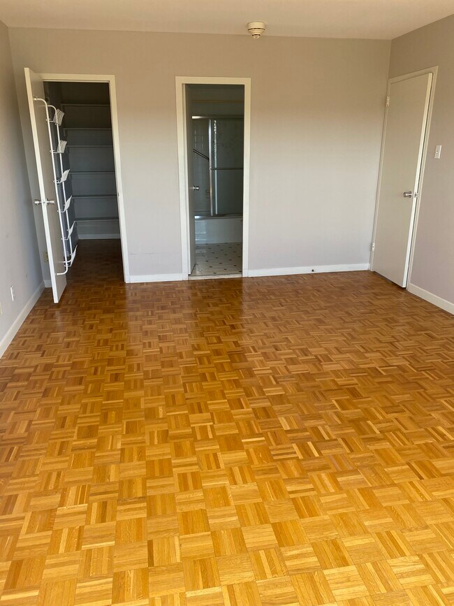 Bedroom 1 w/ bath & walk-in closet - 2324 Madison Rd