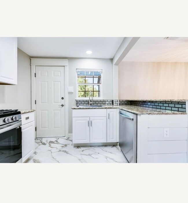 Building Photo - COMING MARCH 2026 - Fully Renovated 3 Bedroom Home!!