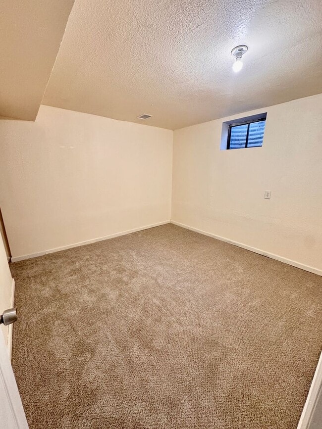 Building Photo - Move-In Ready 4BR Home with Finished Basement, Flex Space & Large Yard