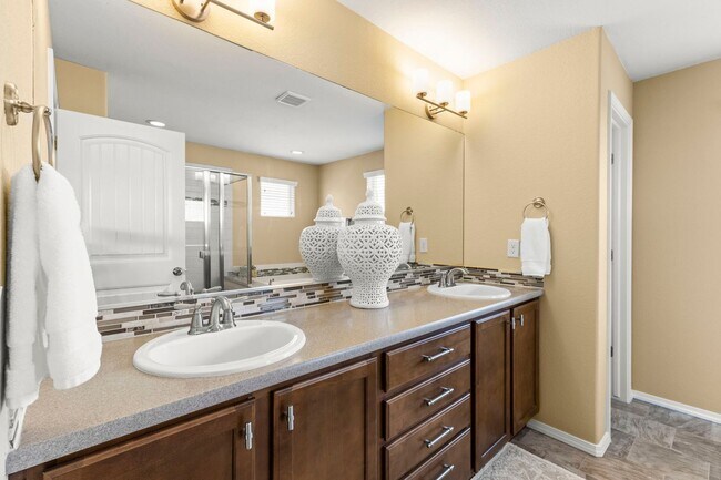 Building Photo - Evolve Real Estate: Meticulous and Luxurious 4 Bedroom + Office + Finished Basement on A Double C...