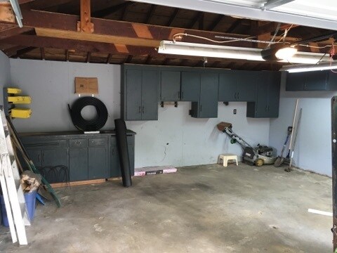 Two car garage, lawnmower and yard tools included. - 7109 14th Ave S