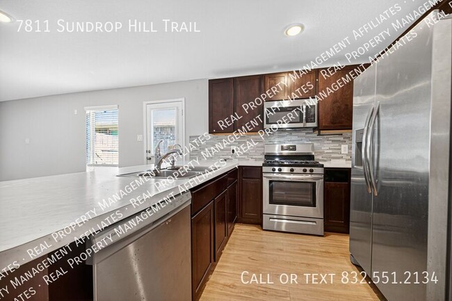 Building Photo - 7811 Sundrop Hl Trl