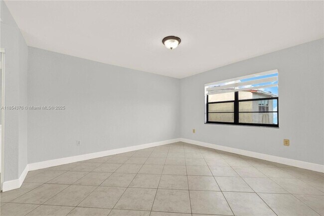 Building Photo - 1335 W 68th St