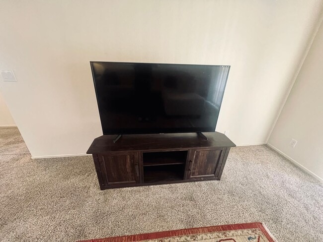 Building Photo - Affordable Comfort in 55+ Guard-Gated Comm...
