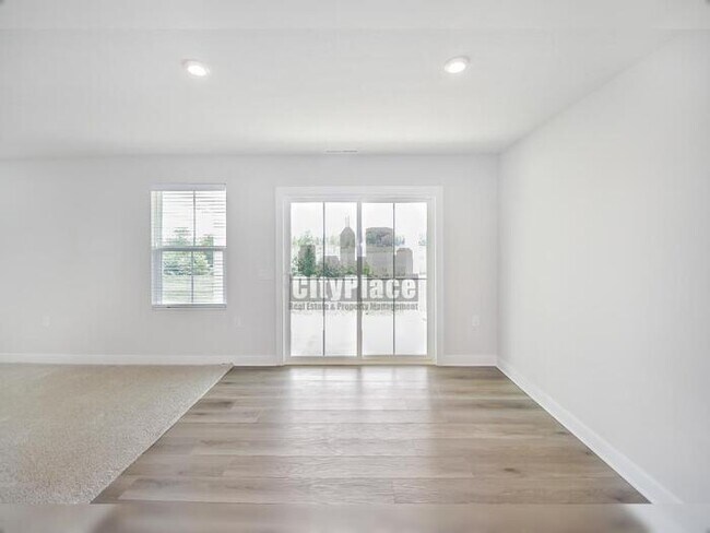 Building Photo - 7009 E Bean Blossom Dr