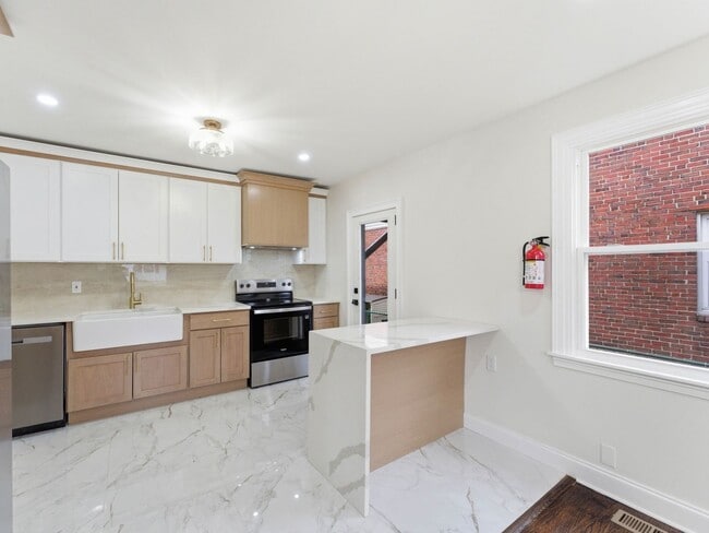 Building Photo - Newly Renovated Pennsauken Rental with Sunroom-Style Back Room, Glass Wall & Basement