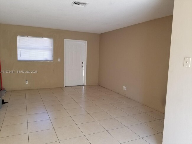Building Photo - 3090 Coral Springs Dr