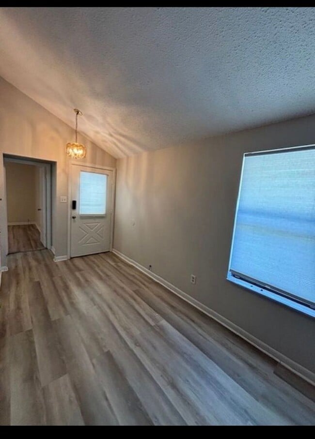 Building Photo - Affordable Living with Comfort & Convenience