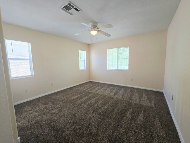 Building Photo - 8295 Golden Flowers St
