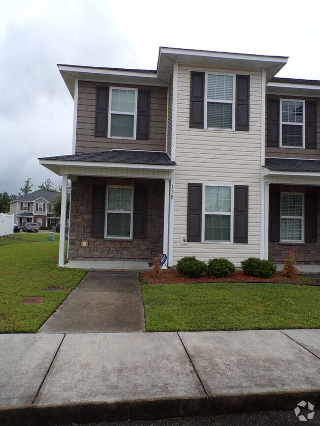 Building Photo - Two Bedroom Townhome located in the Burrou...