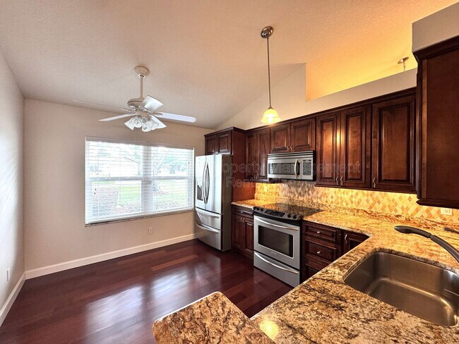 Building Photo - 4818 Breezy Palms Ct