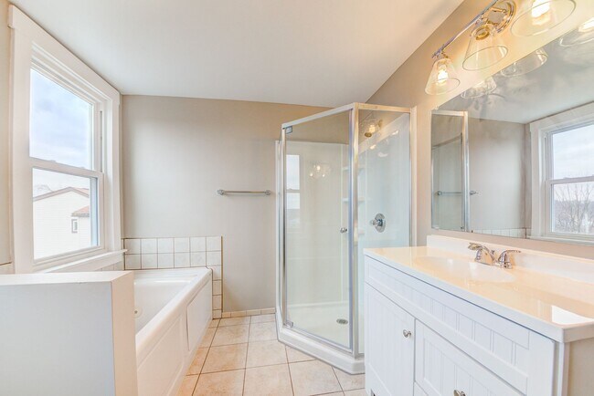 Building Photo - Available JULY 2026  - RENOVATED 3 Bedroom Home w/ Garage, City Views + MORE!