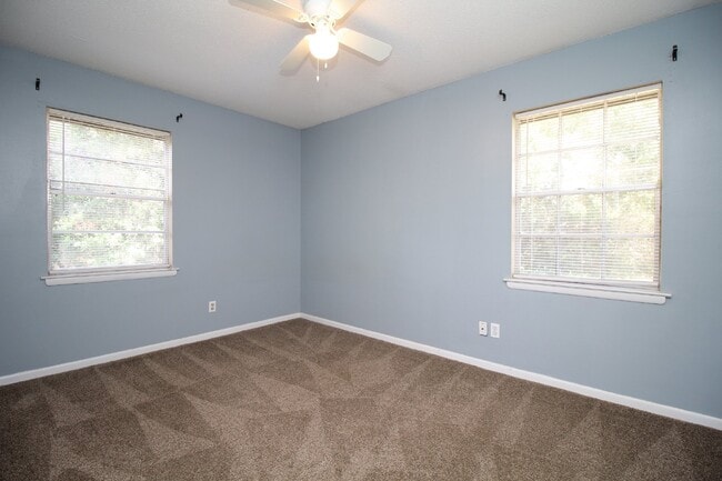 Building Photo - Spacious 3BR/1.5BA Home in Pace with Open Living Area, Tiled Family Room, and Fenced Backyard – M...