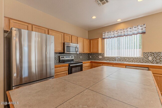 Building Photo - 11605 W La Reata Ave