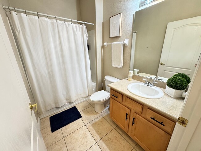 Building Photo - Fully Furnished 5-Bed End-Unit Townhome with Hot Tub in Gated Coral Cay! WASHER & DRYER INCLUDED!