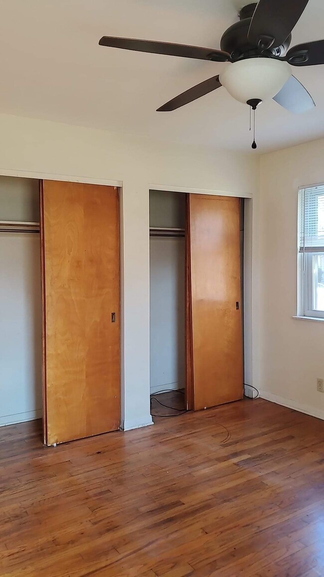 BEDROOM HAS LARGE CLOSETS AND A LINEN CLOSET - 218 Randel Ave