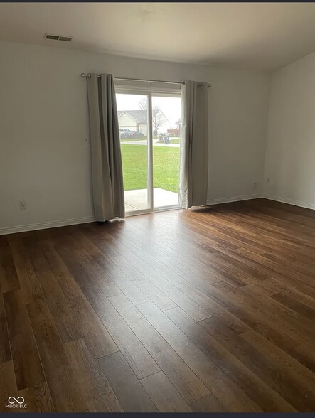 Living room with new Flooring - 1195 Count Turf Ct