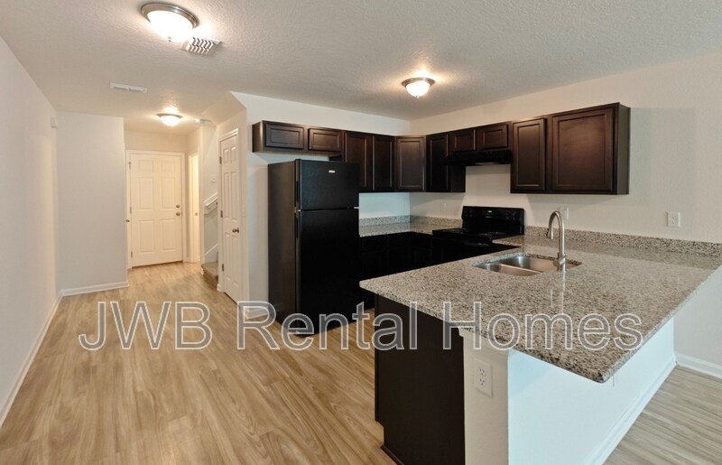 Building Photo - 8498 McGirts Village Ln