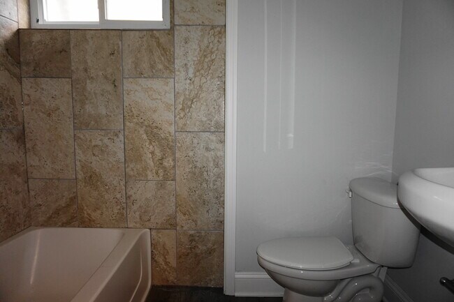 Building Photo - Completely Renovated 3 Bedroom w/ Garage i...