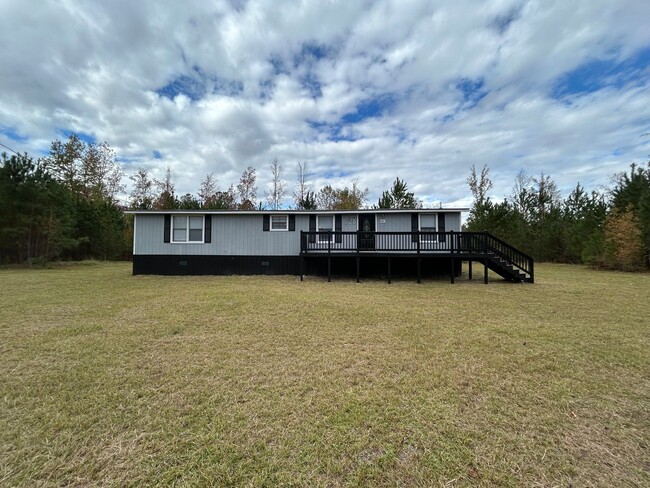 Primary Photo - Spacious 3-Bedroom, 2-Bath Mobile Home on ...