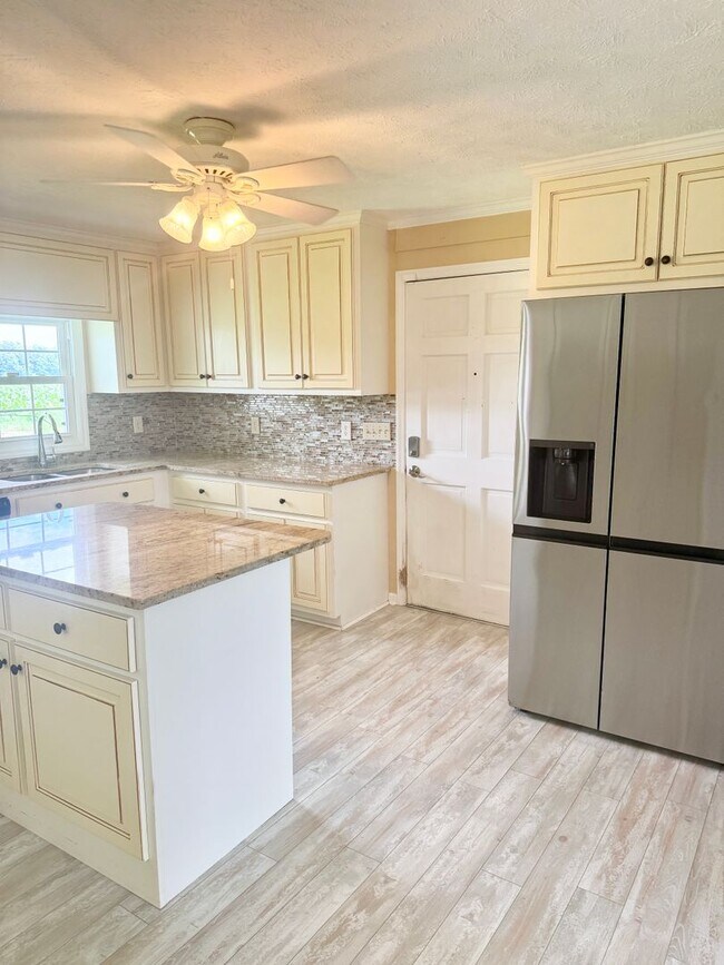 Building Photo - Hard-to-Find Home with Garage & Detached Shed & Modern Updates