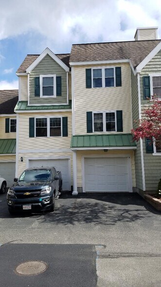 Garage is on left. The condo is the windows on the first level. - 35 Collins St