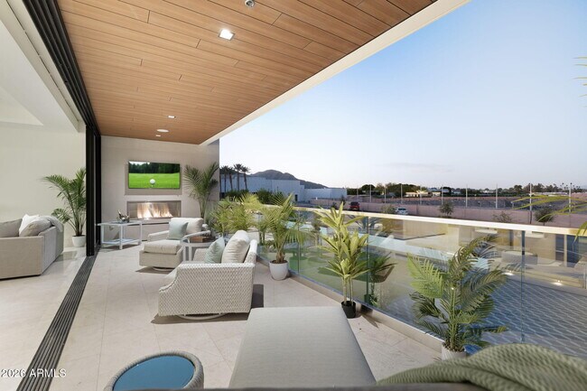 Building Photo - 6587 N Palmeraie Blvd