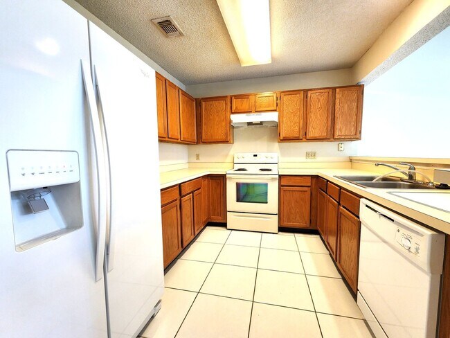 Building Photo - Open Layout; Fenced-in Yard; Quiet Neighbo...