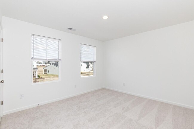 Building Photo - NEW Four Bedroom Home!