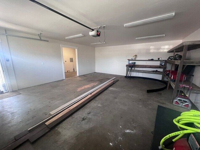 Building Photo - 2 Bedroom 1 bath house with extra large double car garage and extra storage space!