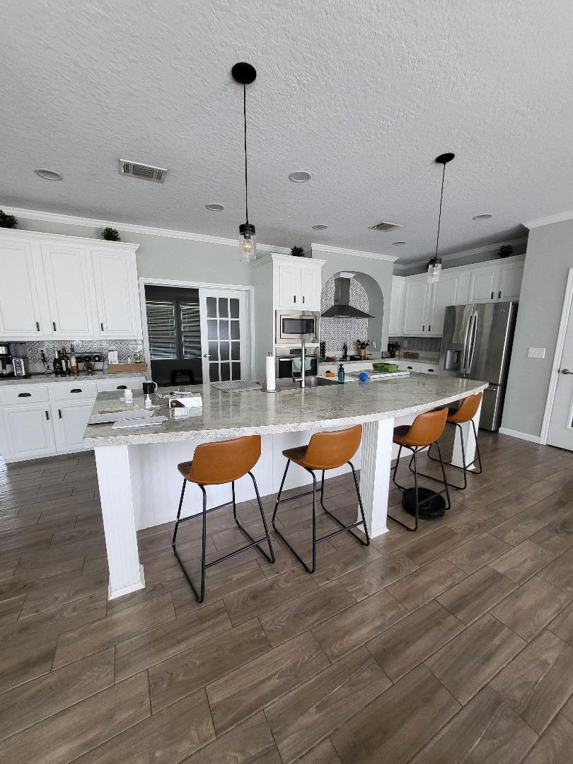 Kitchen- French doors connect to tenant's living room - 3144 Tina Marie Dr