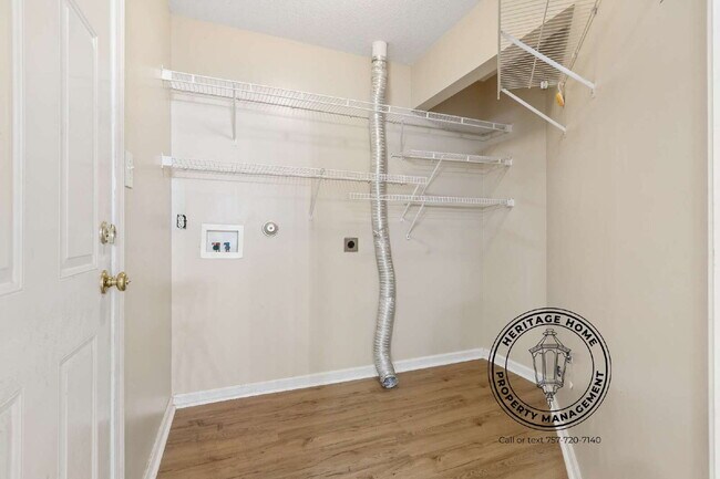 Building Photo - "Charming 4-Bedroom Retreat with Fireplace & Hardwood Floors on Michelle Drive!"