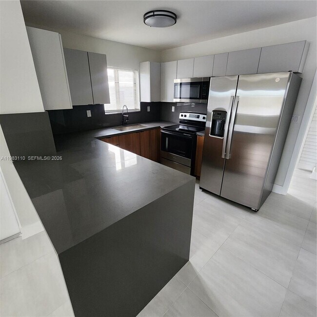 Building Photo - 1171 NW 66th St