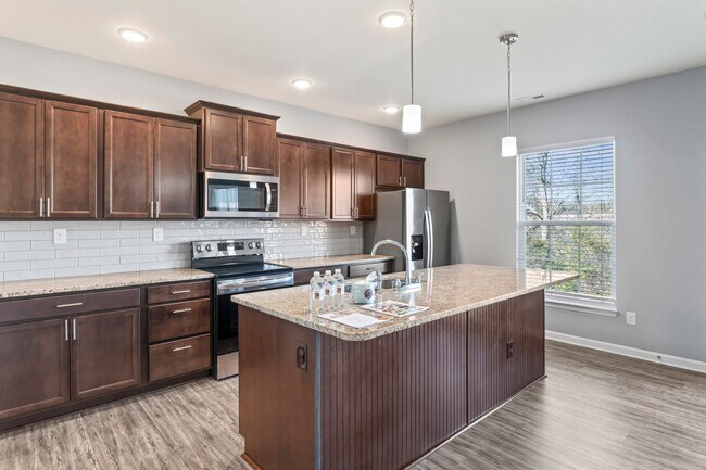 Building Photo - Stunning 4-Bedroom Home with Serene Pond Views