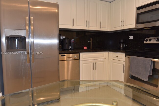 Building Photo - 5555 Collins Ave