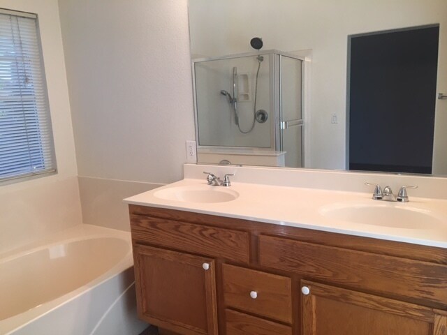 Building Photo - Three bedroom in gated community.