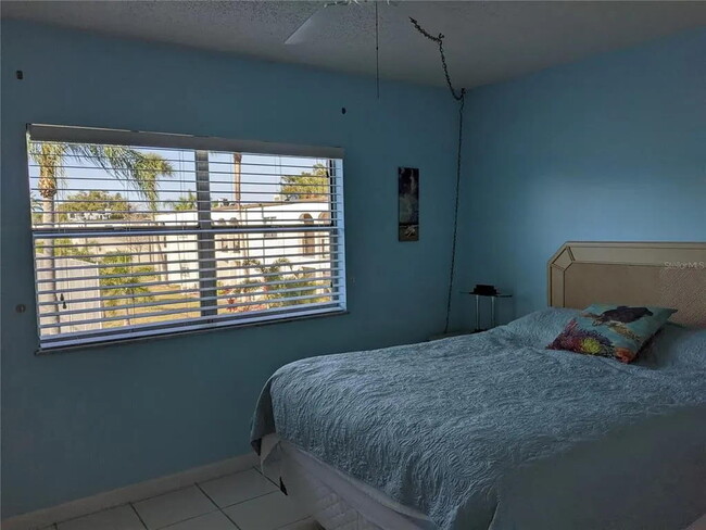 BEDROOM FACING POOL - 7701 Starkey Rd