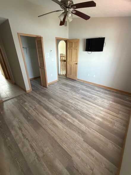 Bedroom upstairs water side - 2590 Sykes Creek Dr