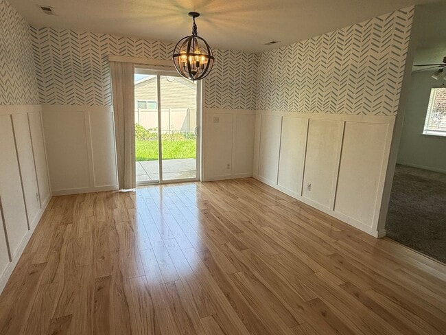 Building Photo - Beautiful patio home with 2 car garage and...