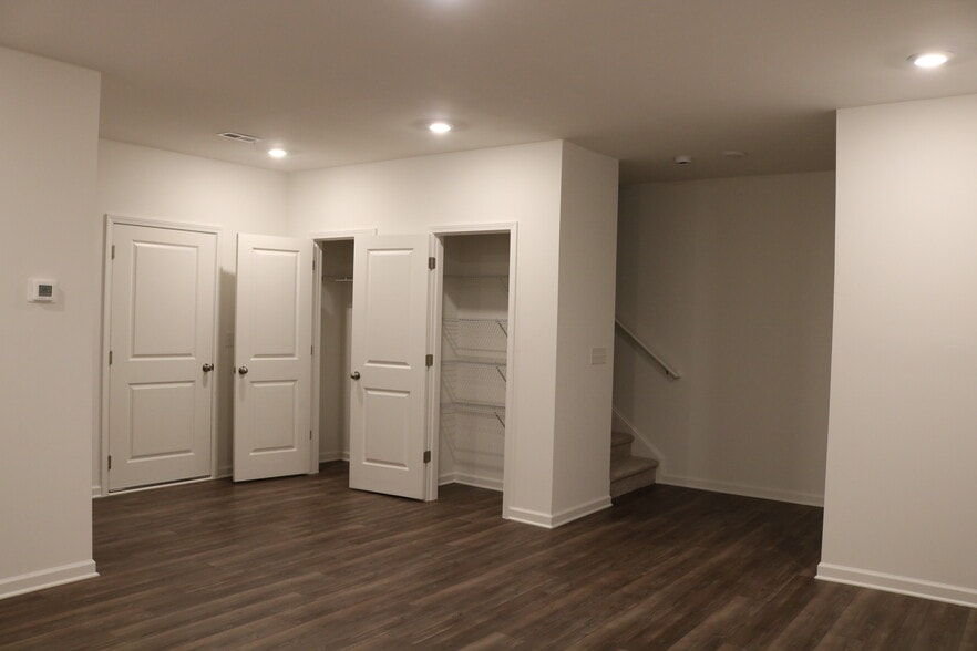 Basement Coat closet and linen closet - 95 Constitution Ave